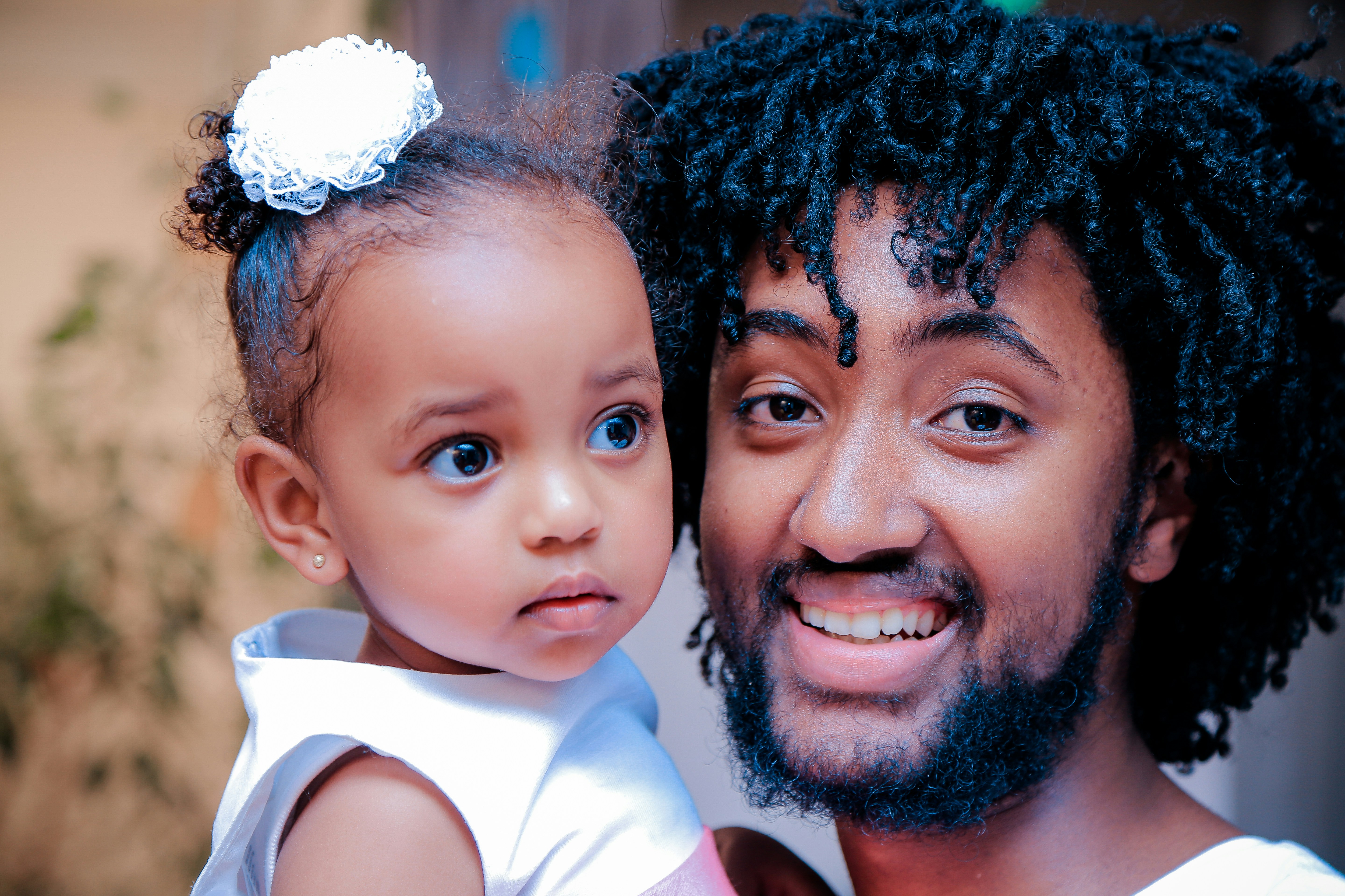 great photo recipe,how to photograph man in white top holding girl baby