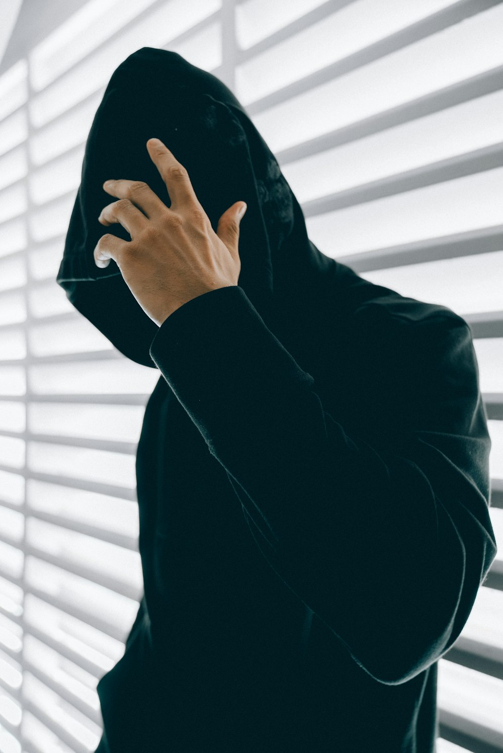 Man in black nike hoodie and blue fitted cap photo – Free Fashion Image on  Unsplash