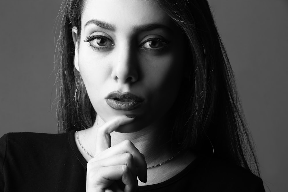 grayscale portrait photo of woman with makeup