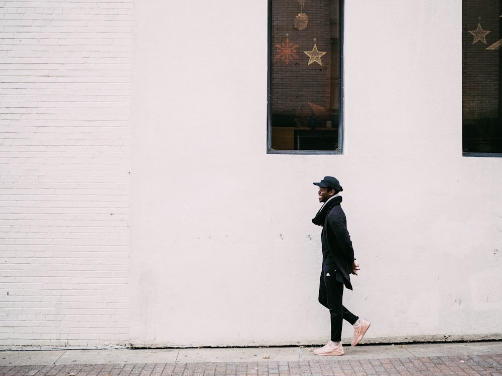 man walking on street