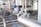 A complex network of industrial equipment featuring shiny metal pipes and machinery, including motors and valves. The setup appears to be part of a processing or manufacturing plant, highlighting various components and instrumentation involved in industrial operations.