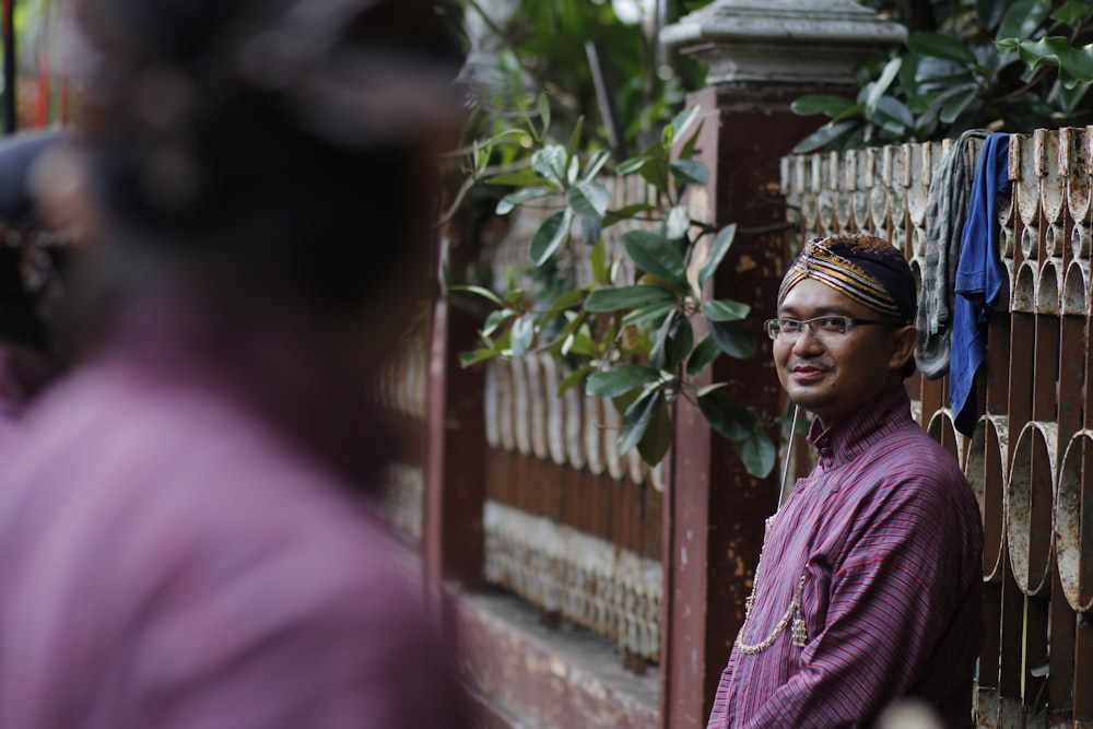 man looking at the camera while smiling