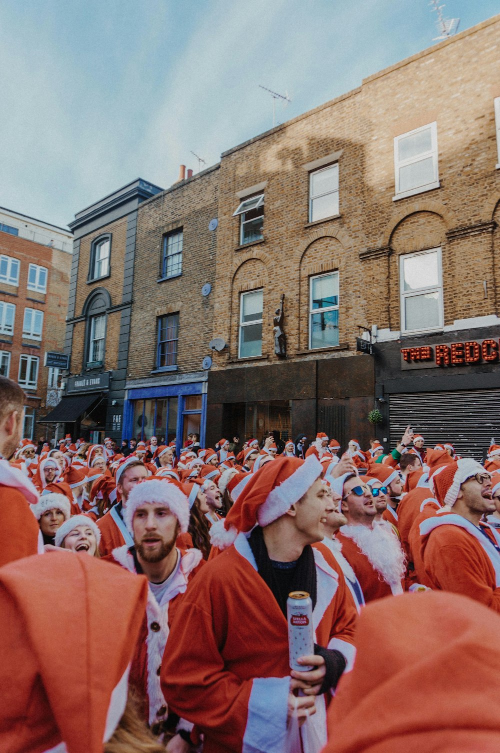 men wearing Christmas costumes