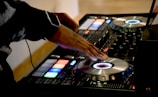person using DJ turn table