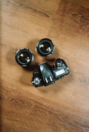black DSLR camera with zoom lens