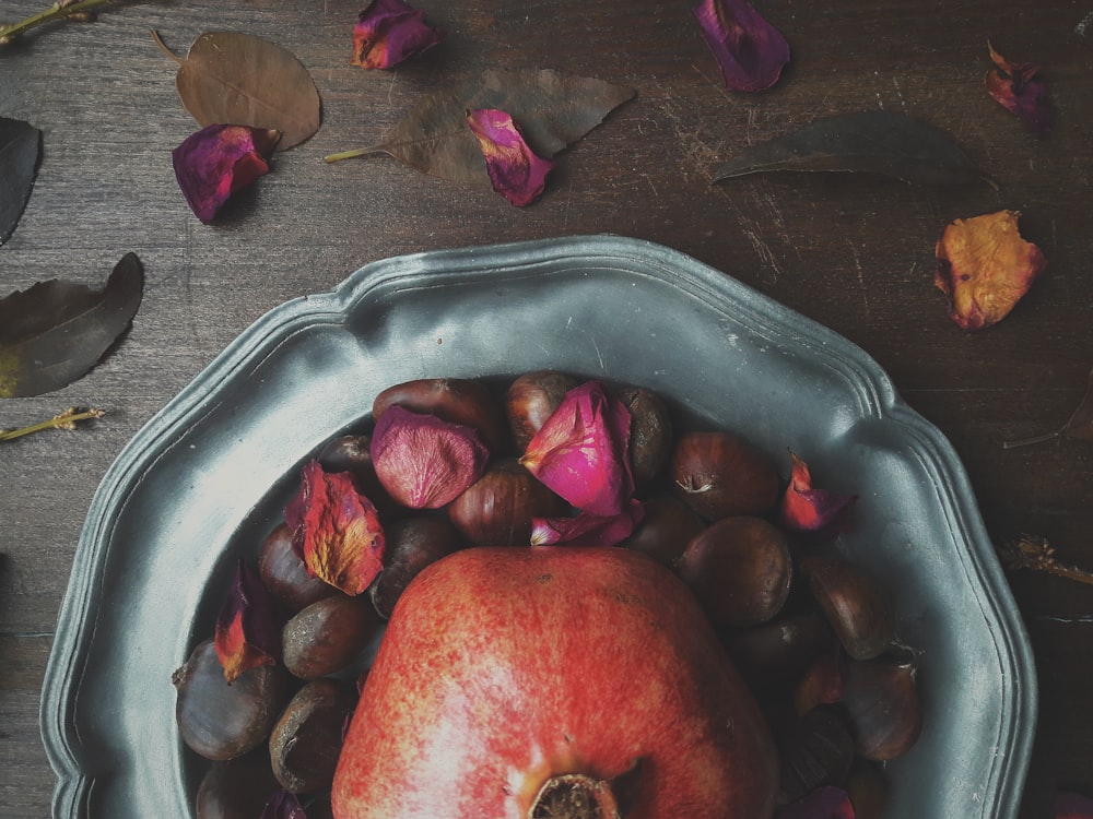 gray plate with flower petals