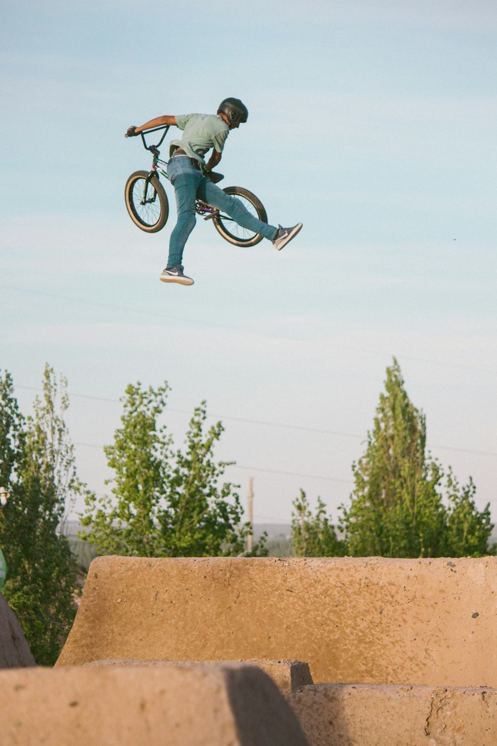 man doing tricks on BMX bike