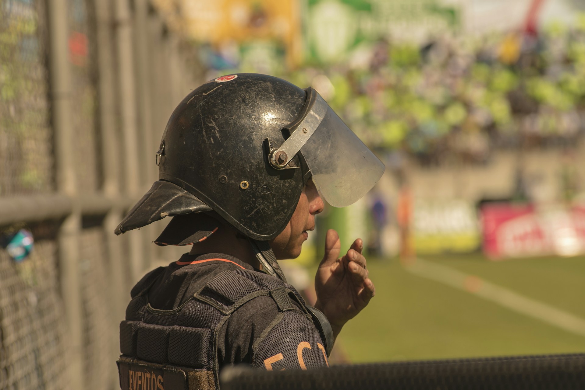 selective focus photography of man wearing helmet