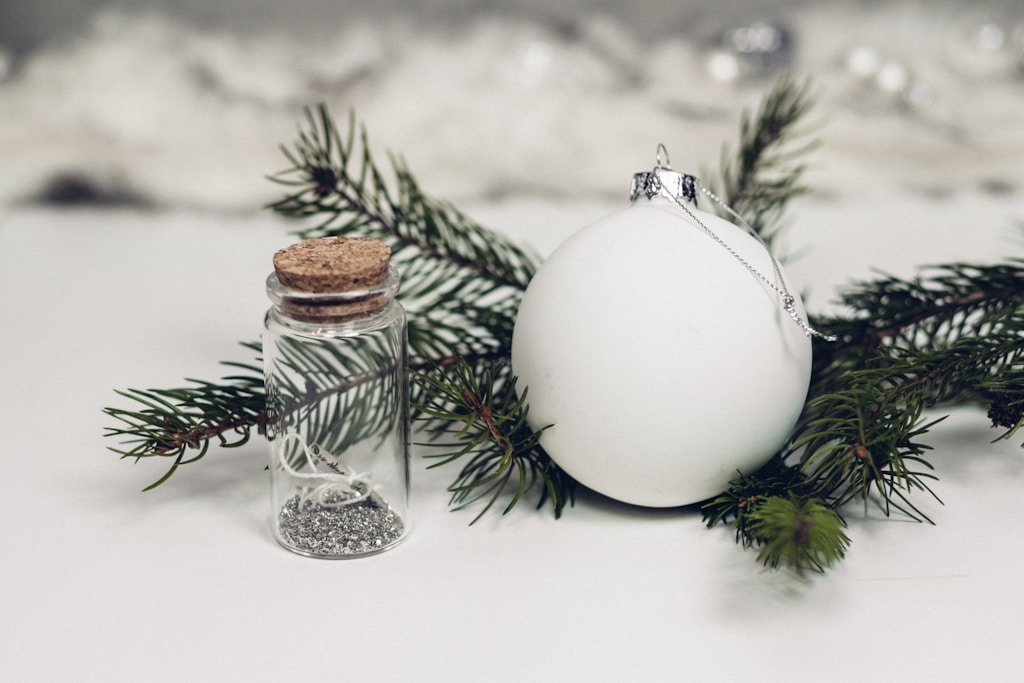 white bauble on top white surface