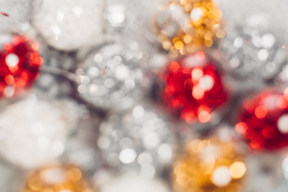 a close up of a red and white ornament