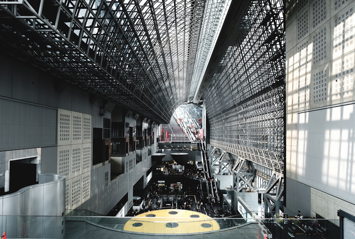 Kyoto Station — dramatic steel framework and grid of windows in the iconic station interior