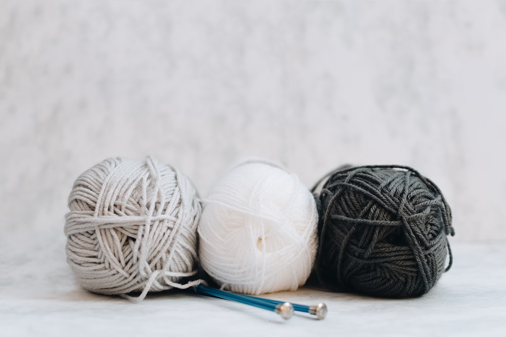 white, gray, and black yarns