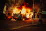 broken car covered with flame