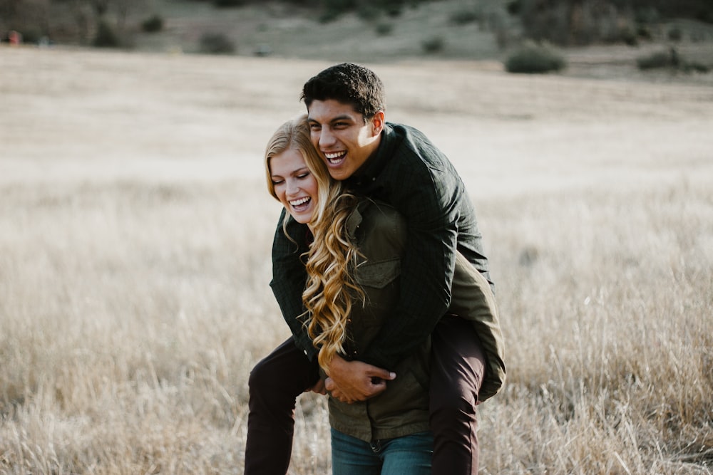 Woman giving man piggyback ride photo – Free Adorable couple Image on  Unsplash