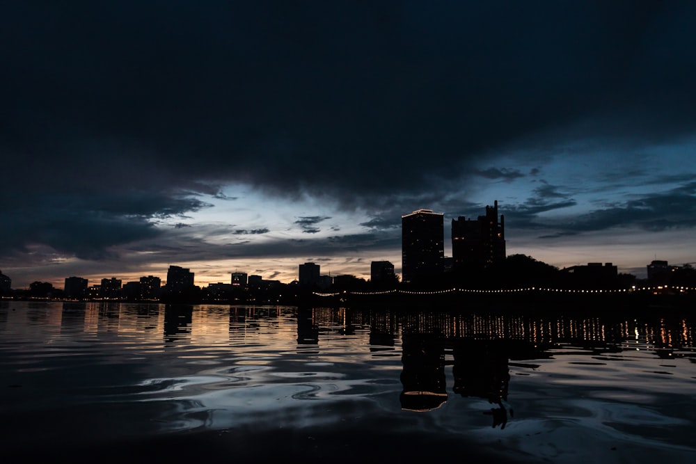 scnery of buildings near body of water