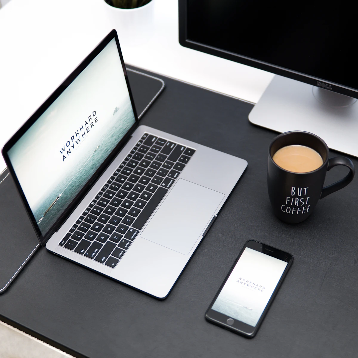 Laptop, coffee mug, and phone on a clean desk — editorial cover for a field note about operating rhythm.