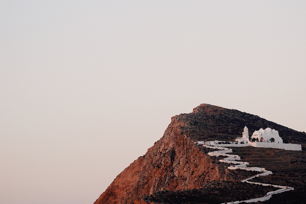 photo of white building on hilltop