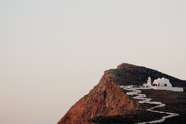 Photo of white building on hilltop — Folegandros, Greece