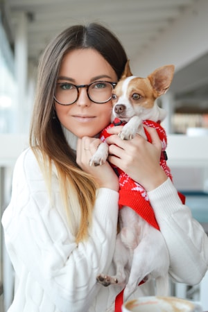 pet photography,how to photograph woman wearing sweater while cuddling chihuahua