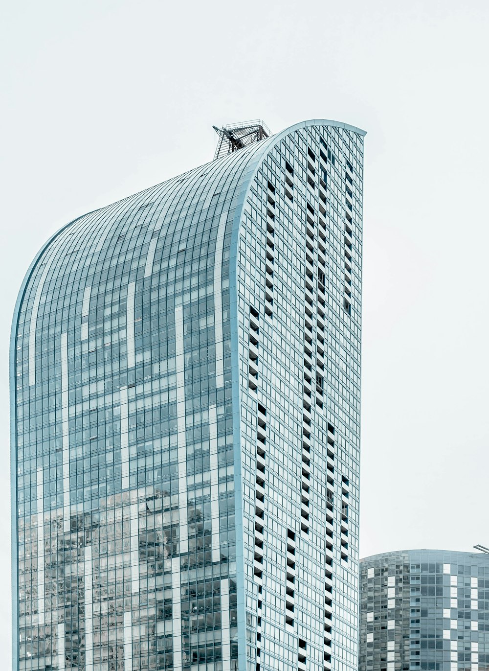 blue and clear glass building during daytime