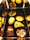 Close-up of a colorful Christmas snack box with assorted treats and festive decorations