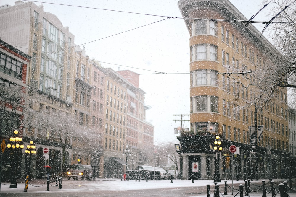 concrete road beside building during winter season