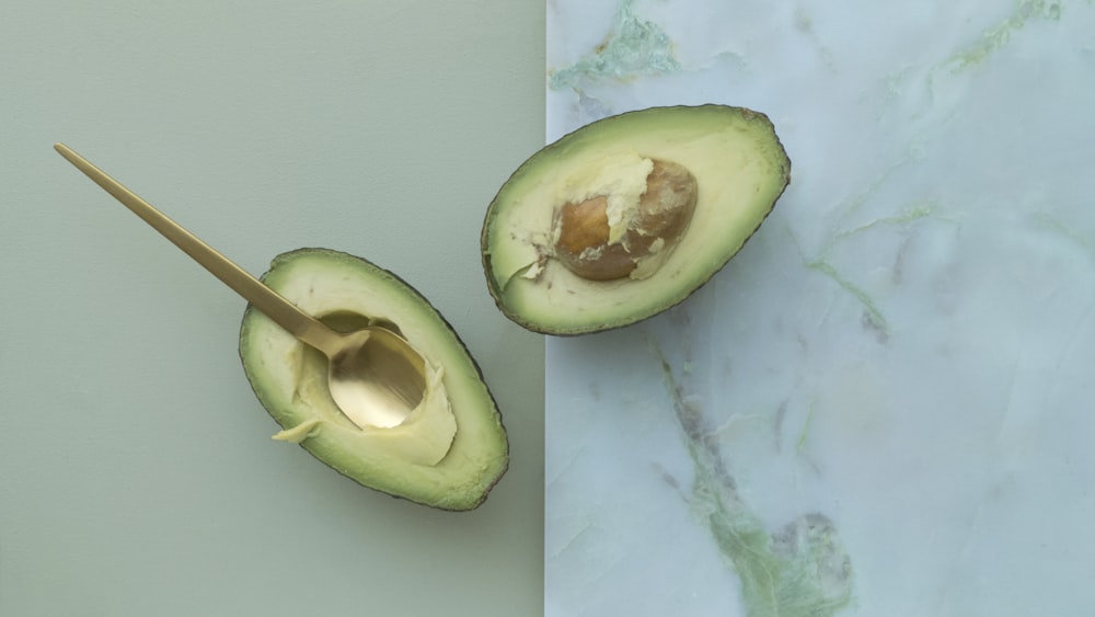 two sliced of avocados