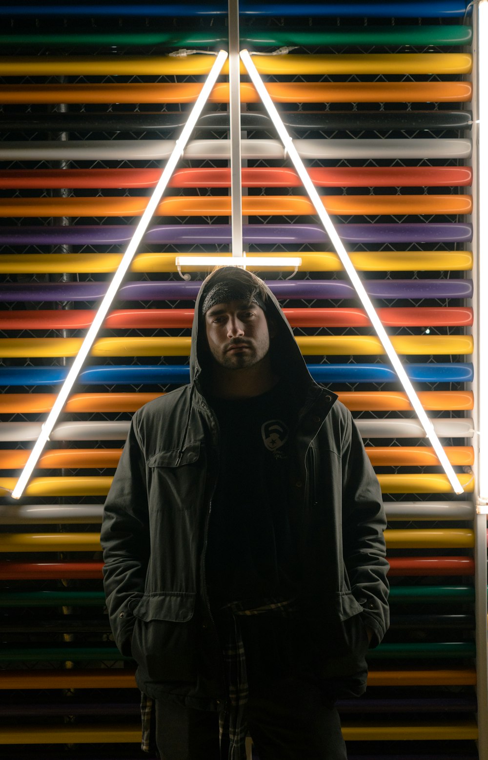 man standing near LED bar light