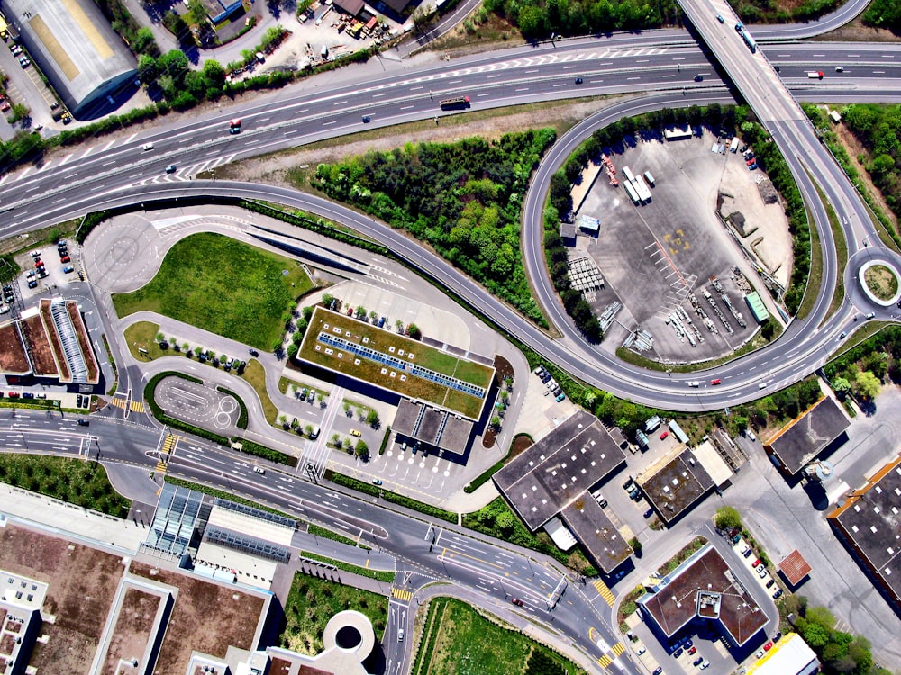 aerial photography of highway with buildings