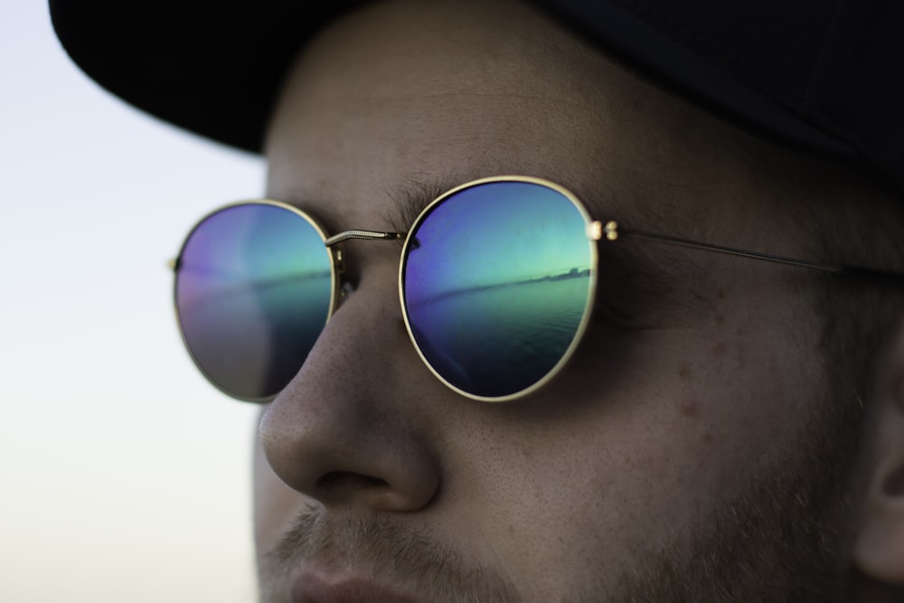gold-colored framed sunglasses