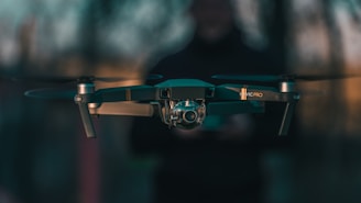 black quadcopter drone close-up photography