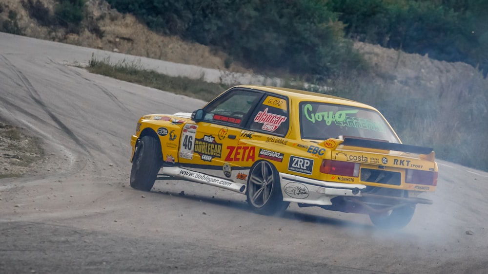 yellow racecar on road