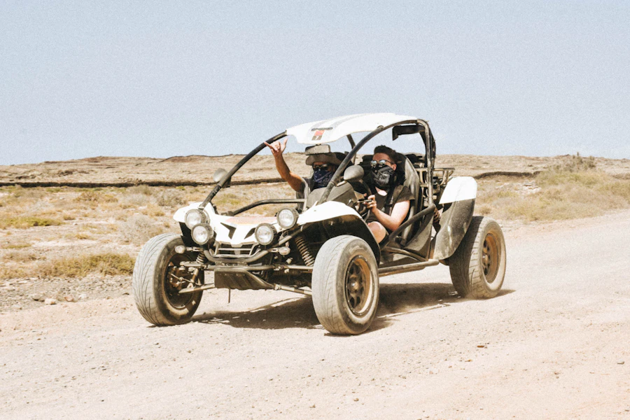 Off-road buggy on a dusty dirt track in Spain
