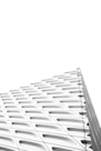 white concrete building low angle photography