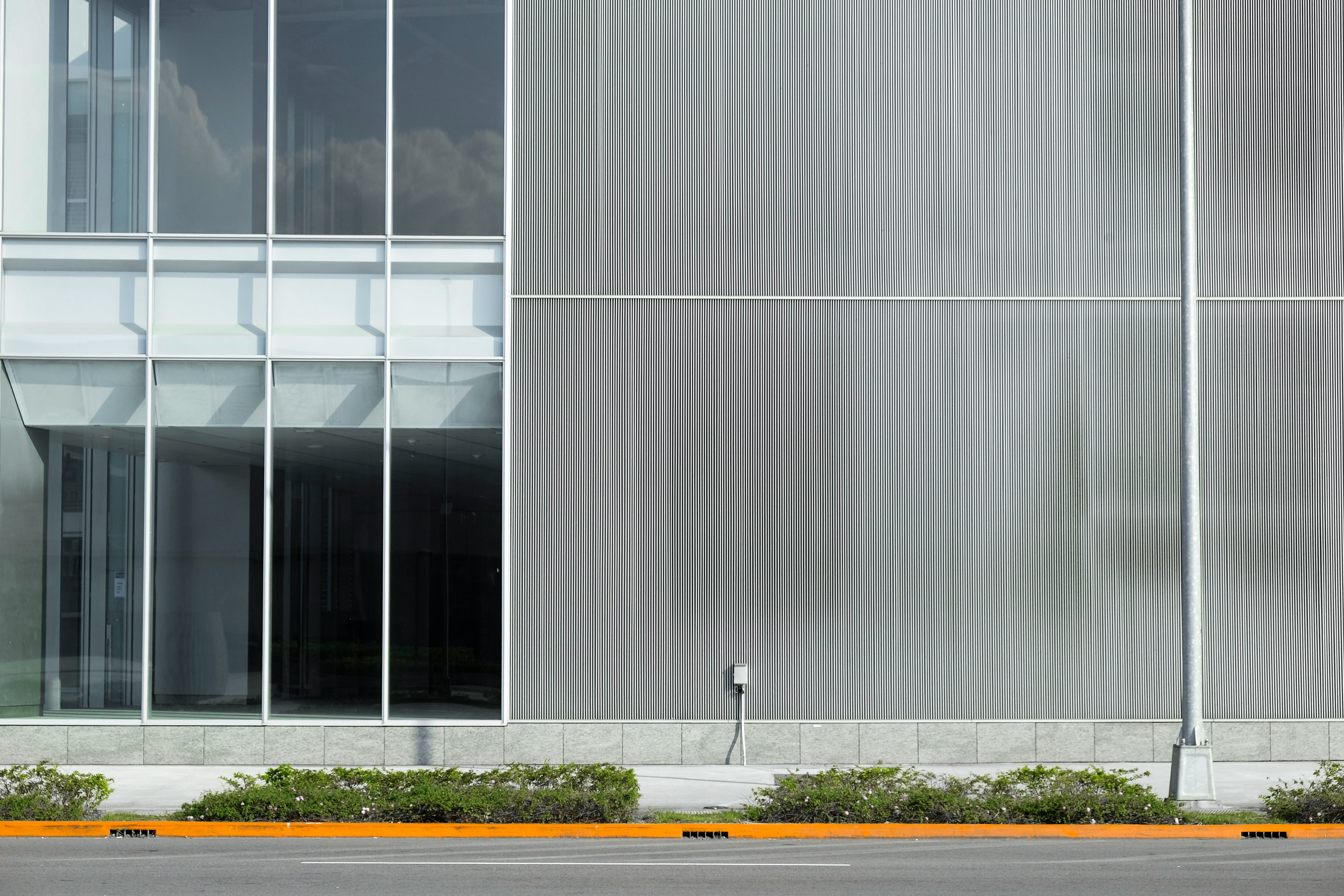 gray and white concrete building at daytime