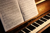 music note on brown piano