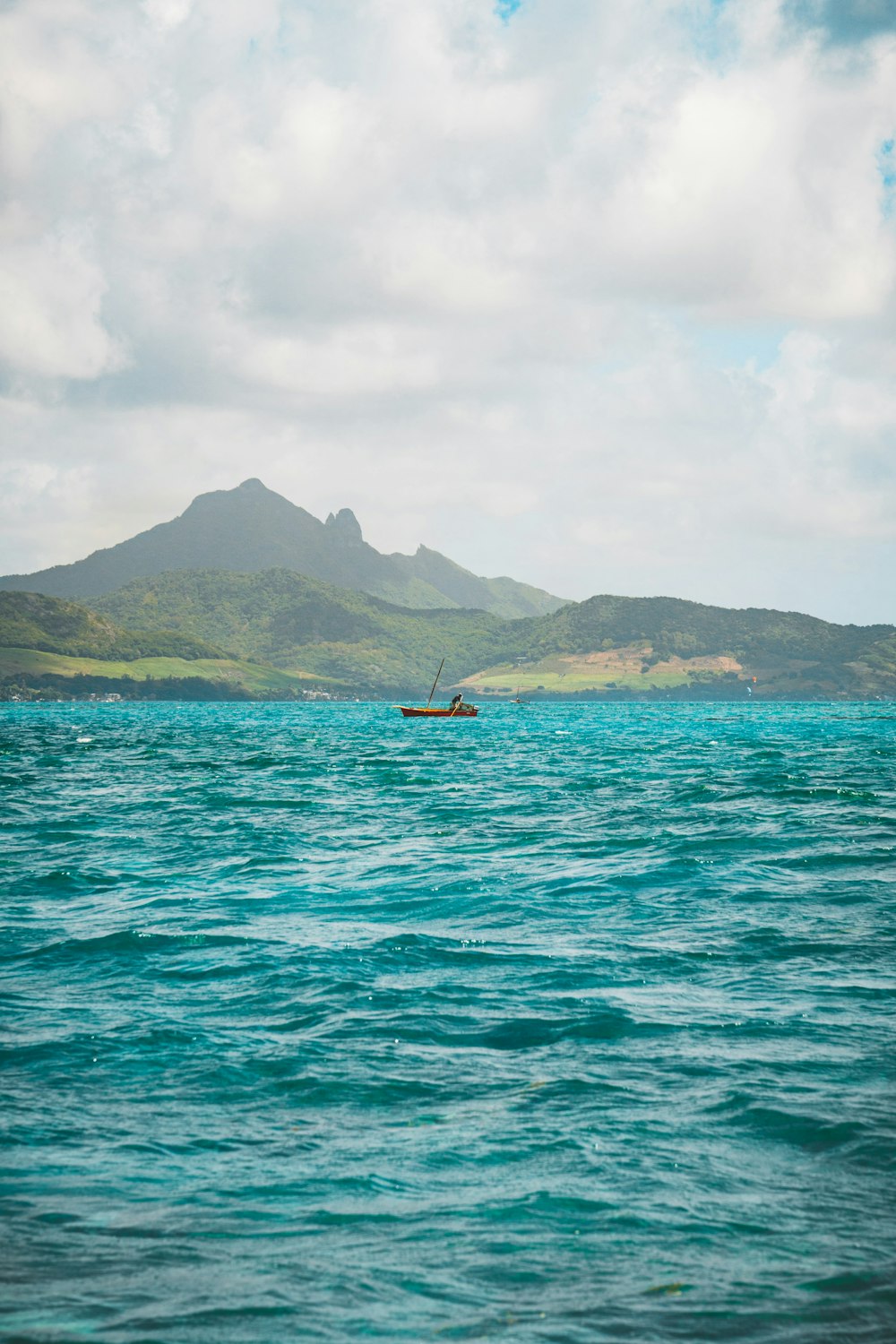 blue sea near mountains