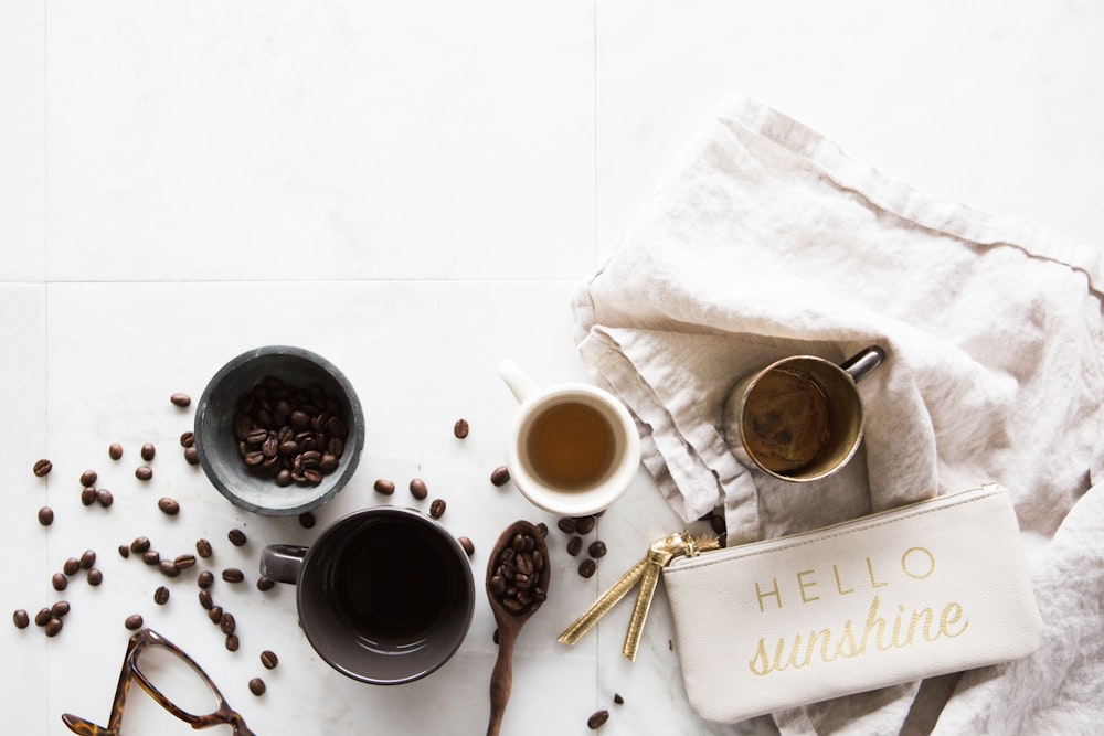 four coffee cups on floor