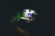 flat screen hacking computer monitors on table