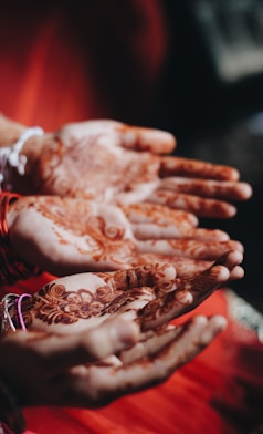 women with mendhi tattoos
