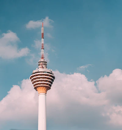 KL Tower (Menara Kuala Lumpur) against a clear sky