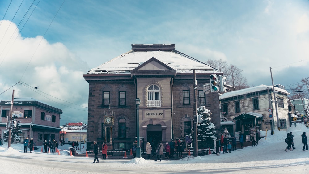 people walking on the snowy road