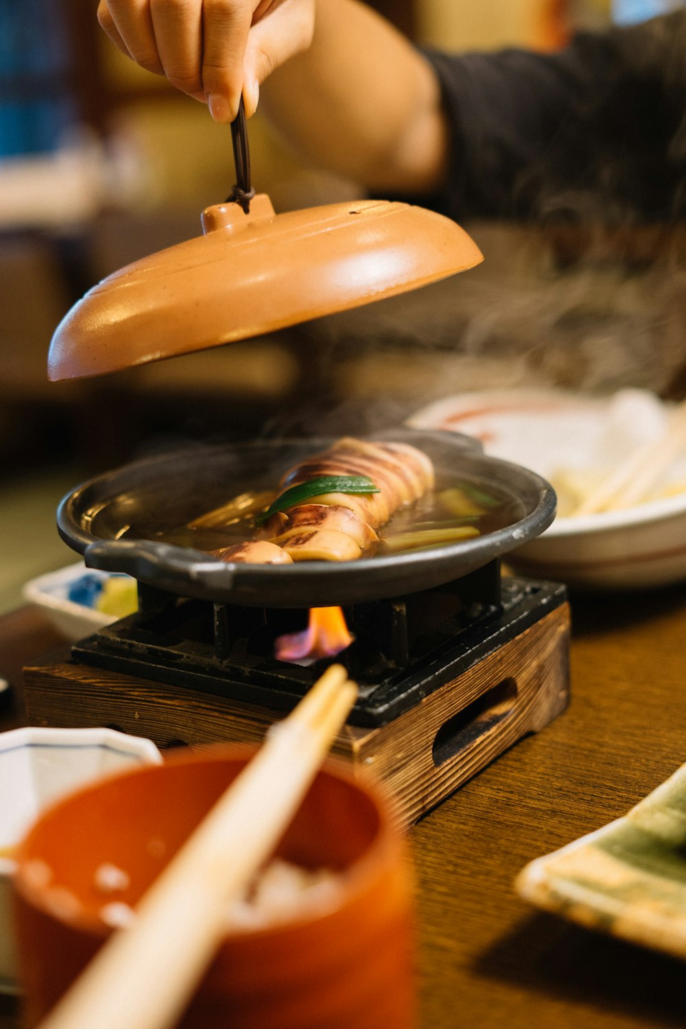 man cooking dishes