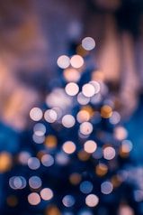 a blurry photo of a lit christmas tree