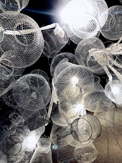 A vibrant display of various mesh products ranging from delicate home screens to sturdy industrial meshes.