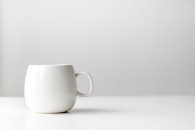 white ceramic mug simple zoom background