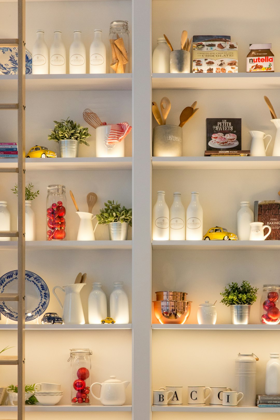  white ceramic bottles on shelf cupboard