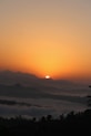 sun peeping on ice mountain