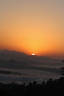 sun peeping on ice mountain
