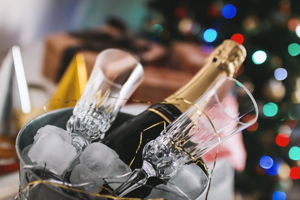 champagne bottle and glass in bucket